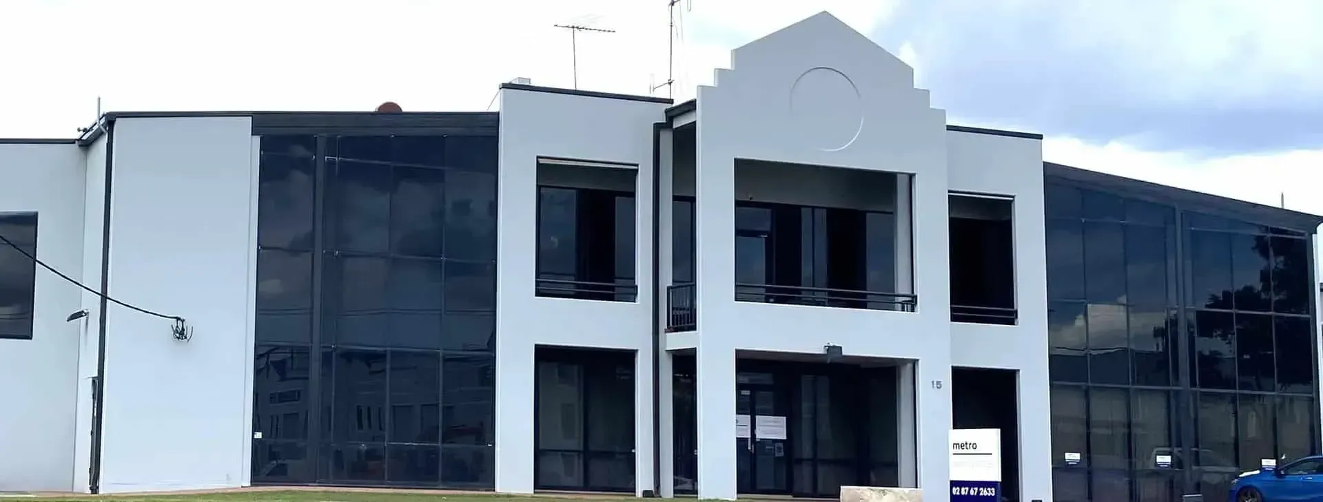 Factory and office building exterior repaint