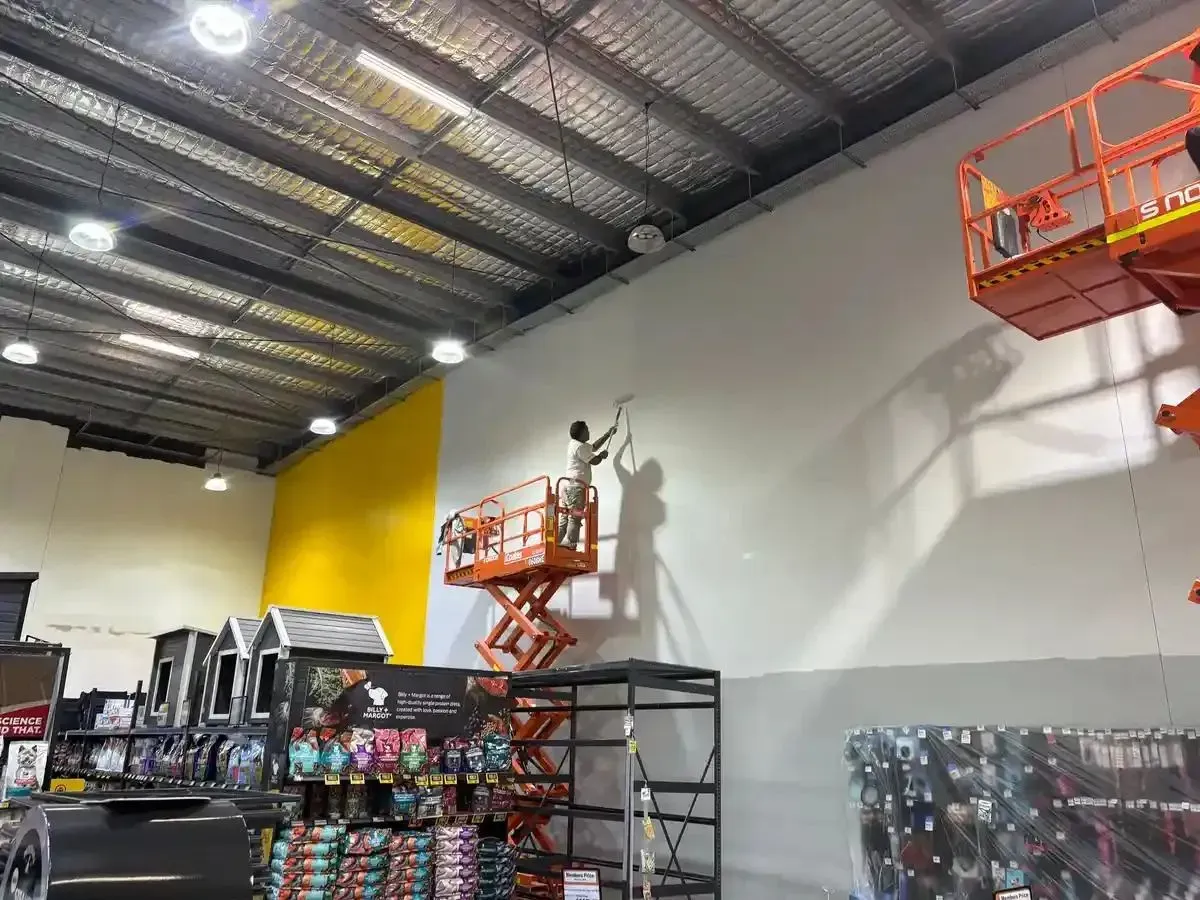 Final coats being applied in a retail store fitout