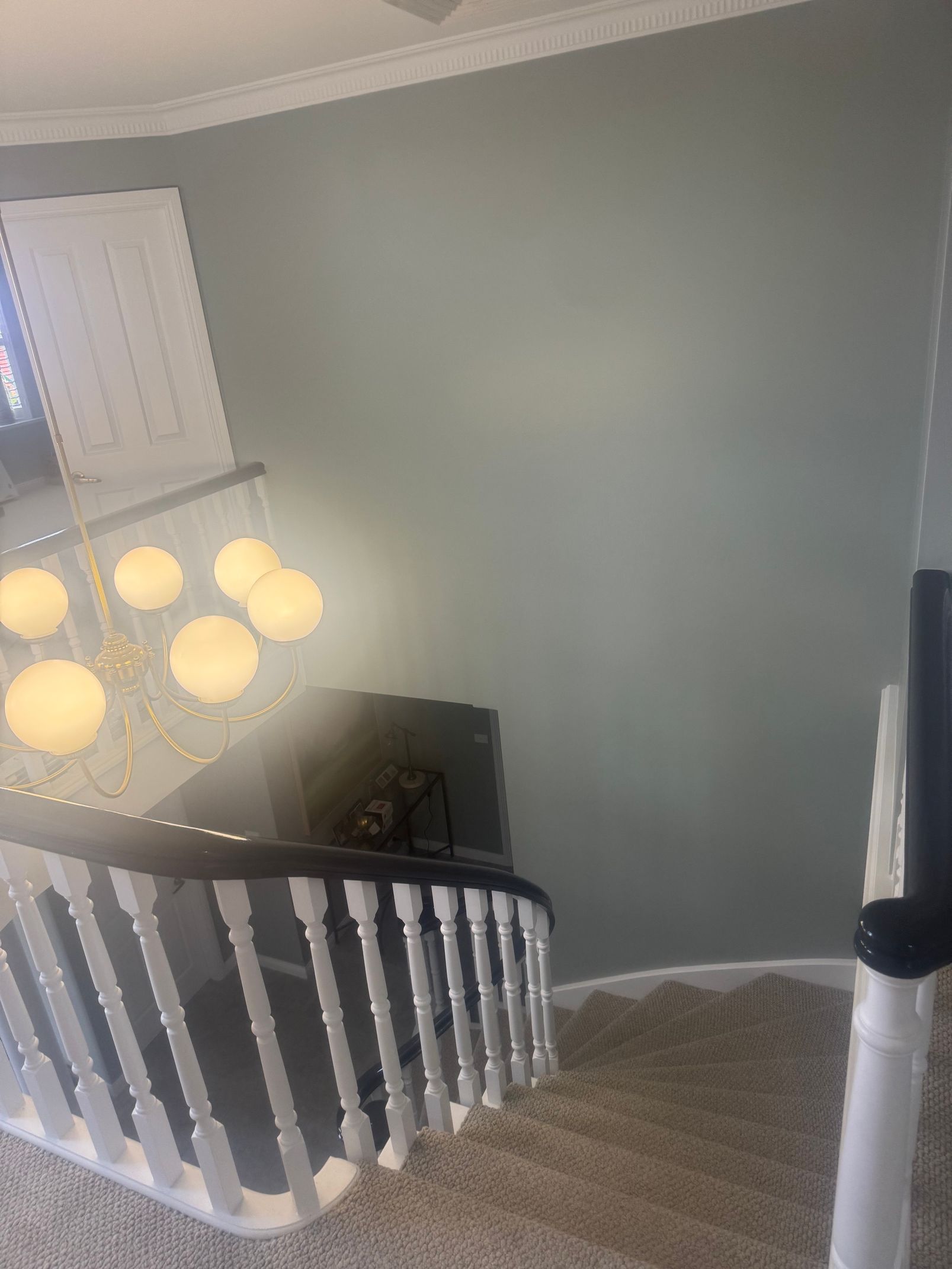 Interior detail of a repainted kitchen with pendant lighting