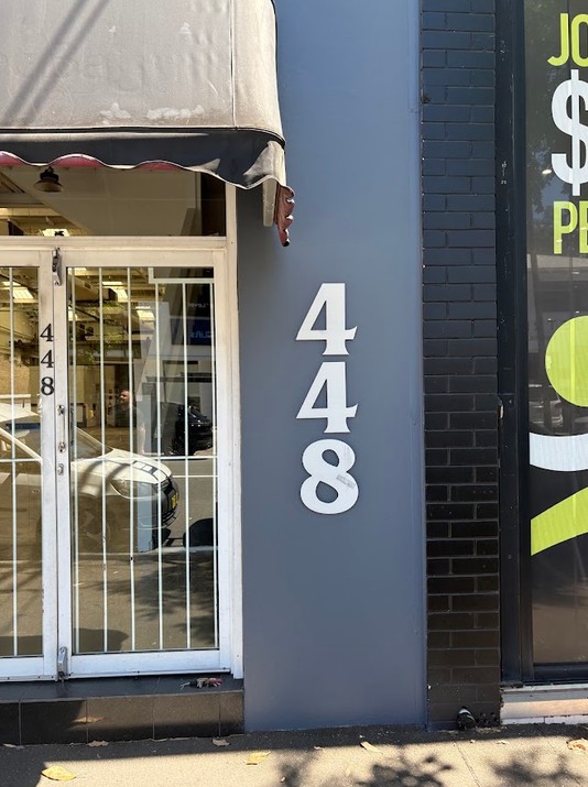 Repainted retail shopfront in Alexandria