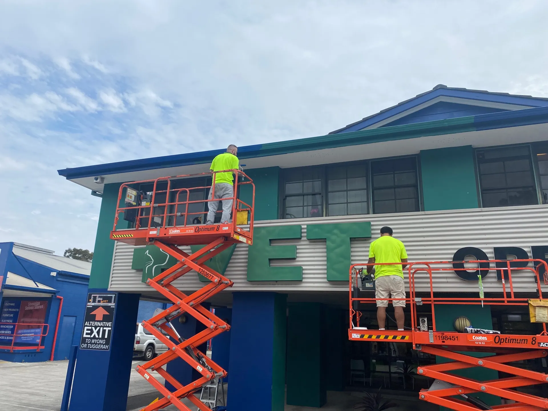 Scissor lifts set up outside Greencross Vets Tuggerah for the exterior repaint